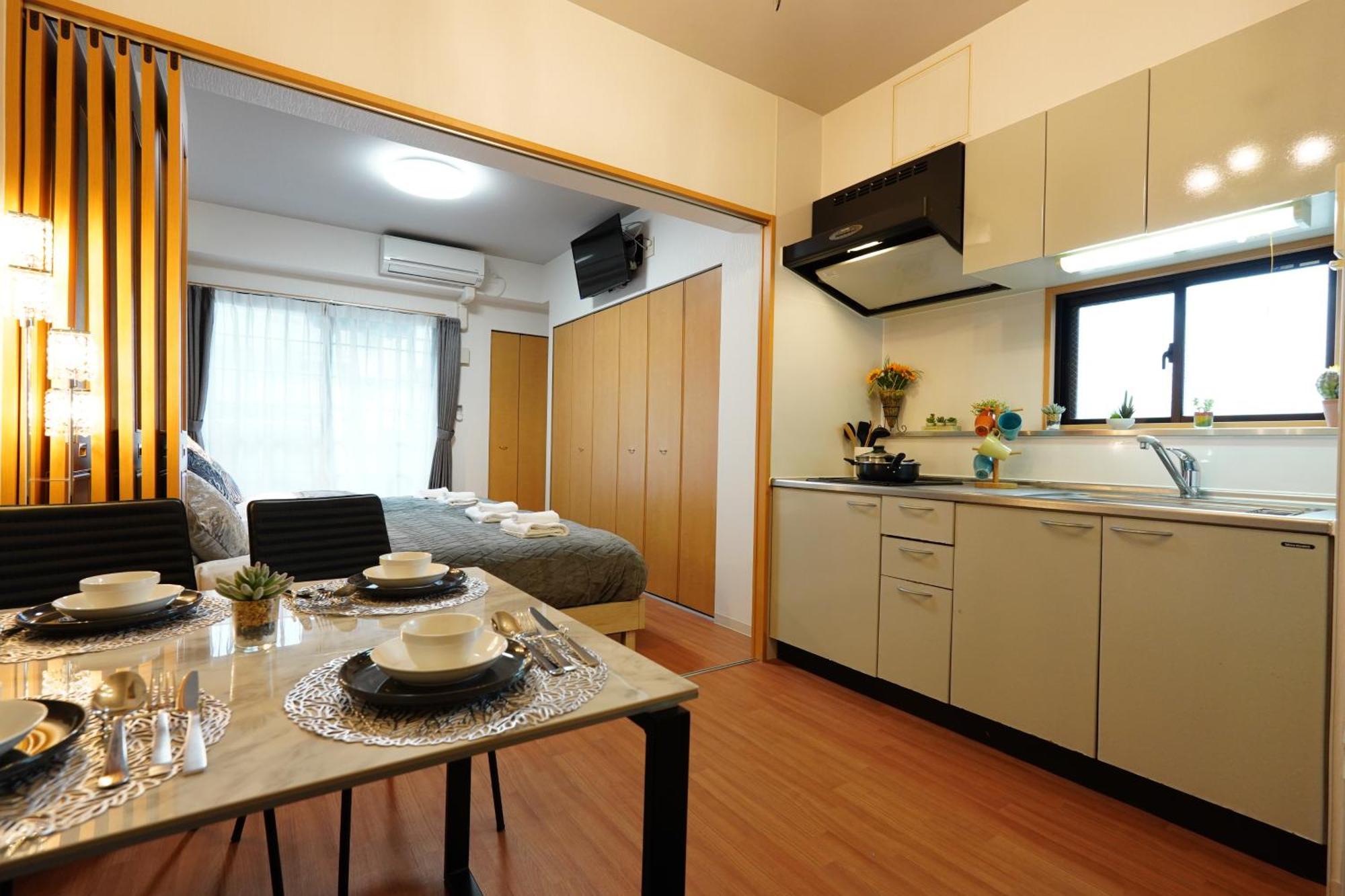 Апартаменты Kuromon Royal Осака Номер фото